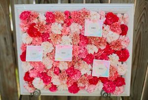 Pink Carnation Escort Card Display