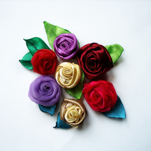 Rolled Ribbon Rose | FaveCrafts.com