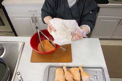 Return to dry ingredients and shake to coat