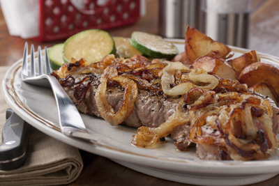 Onion Smothered Strip Steak