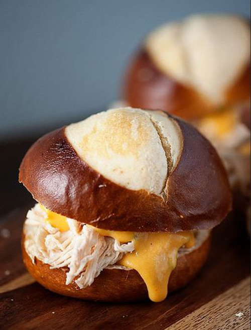 Cheesy Chicken Sliders on Pretzel Buns