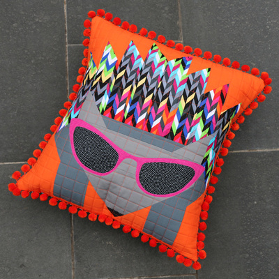 Add Pompoms to a Cushion or Pillow