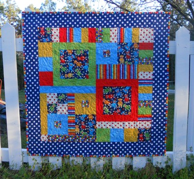Sock Monkey Circus Baby Quilt | FaveQuilts.com