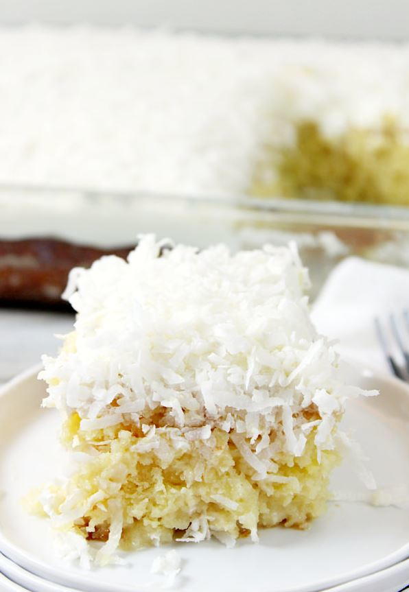 Coconut Cream Poke Cake Dream | FaveSouthernRecipes.com