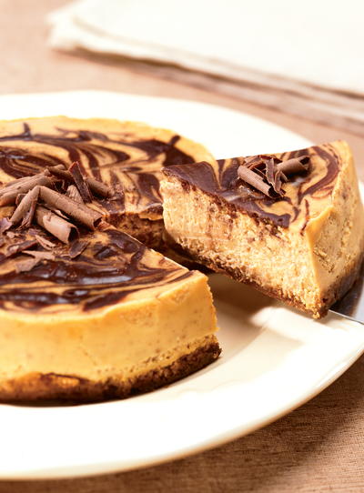 Gingersnap Crusted Pumpkin Chocolate Cheesecake