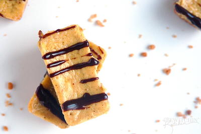 Eggnog Cheesecake Bars with Chocolate Rum Drizzle