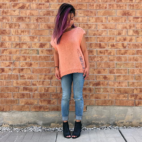 This reminds me of a sweater from Killstar Edgy Oversized Knit Tee