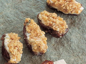 Dates Stuffed with Roquefort Cheese and Topped with Walnuts