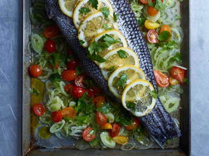 Roasted Whole Sea Bass with Fennel, Meyer Lemons, and Cherry Tomatoes  