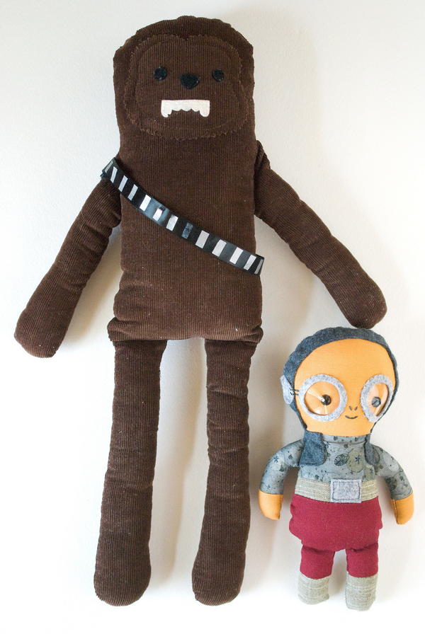 Image shows two Star Wars stuffed toys: Chewbacca and Maz.