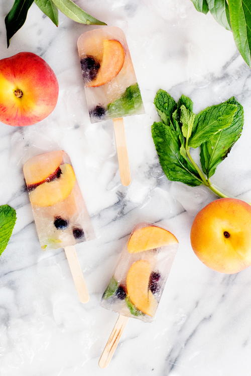 Boozy Peach Sangria Popsicles | TheBestDessertRecipes.com