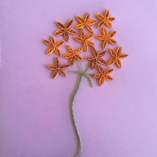 Orange Starburst Flower Quilling Designs