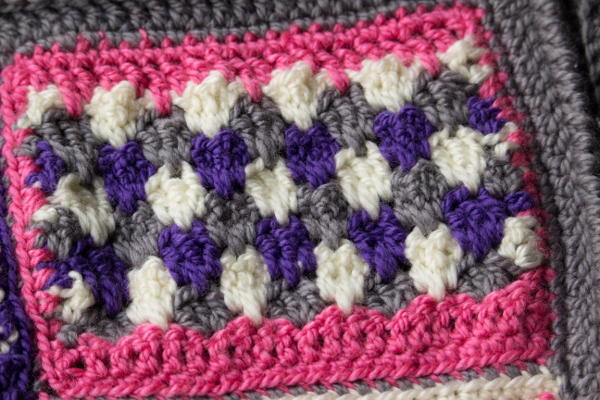 Image shows the top right panel of the Groovy Berry Crochet Messenger Bag Pattern free.