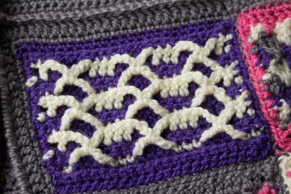 Image shows the top left panel of the Groovy Berry Crochet Messenger Bag Pattern free.