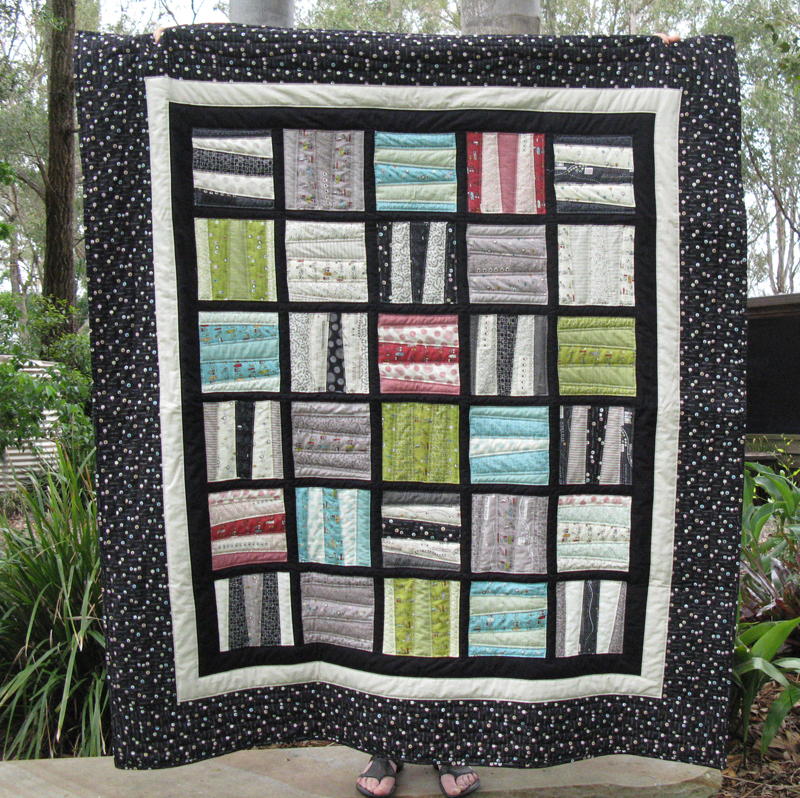 Scrappy Blocks Quilt | FaveQuilts.com