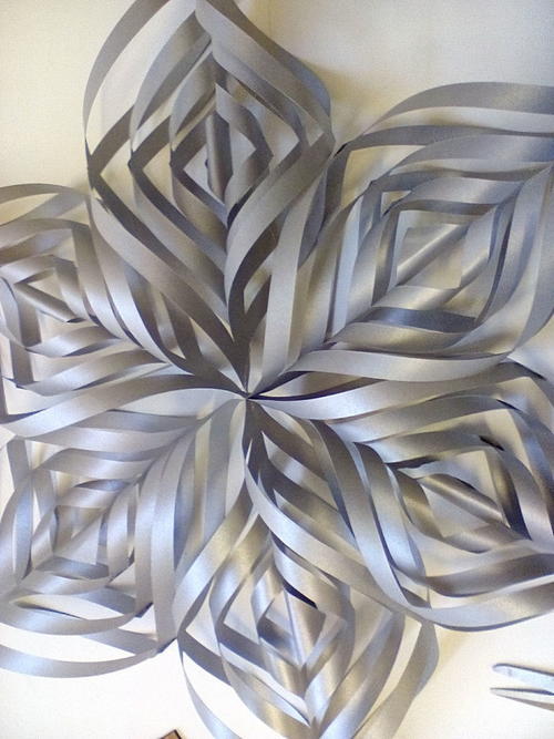 Shimmering Silver Spiral Snowflakes