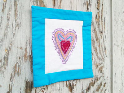Turn Your Embroidery Project into a Quilted Wall Hanging