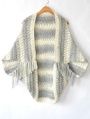 Easy Light Frost Crochet Blanket Sweater Shrug | AllFreeCrochet.com