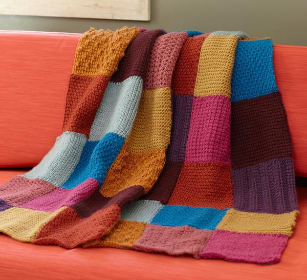 Image show the Granny Square Tunisian Throw.