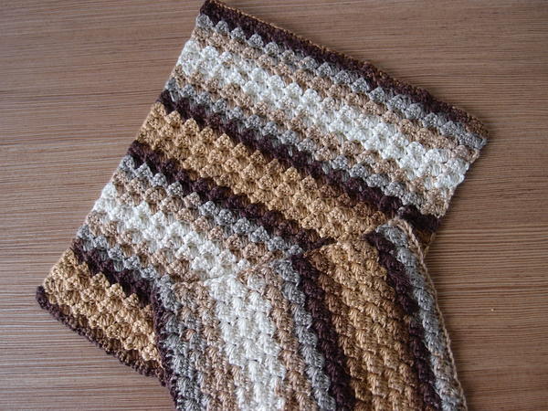 Image shows two of the Bamboo Dishcloths/Towels in multi-colored brown, white, and gray stripes.