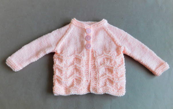 Gentle Breeze Baby Sweater Pattern | AllFreeKnitting.com