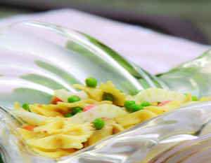 Farfalle Salad with Shaved Fennel, Fresh Peas, Quartered Artichokes, and Mango-Dijonnaise