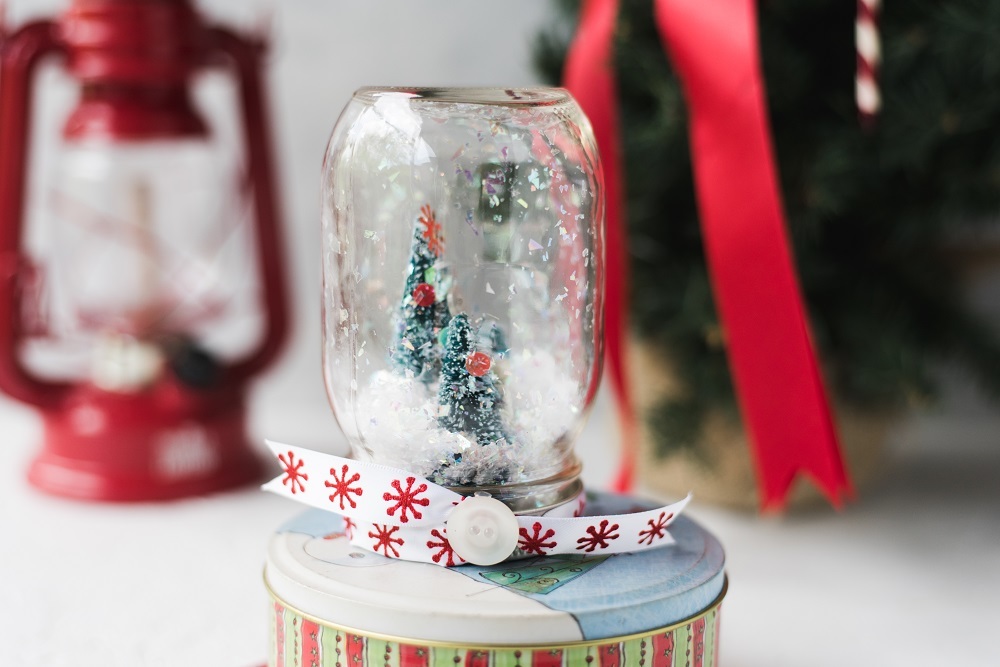 Waterless Snow Globe Craft | FaveCrafts.com