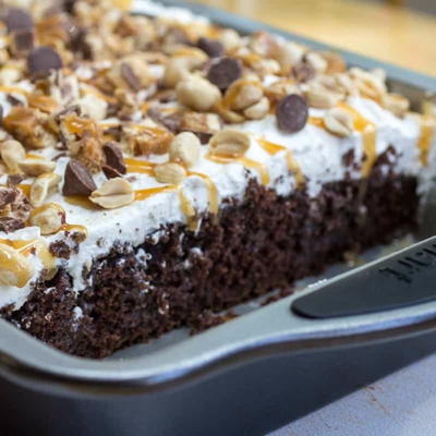 Homemade Snickers Cake Recipe with Peanuts Caramel and Chocolate