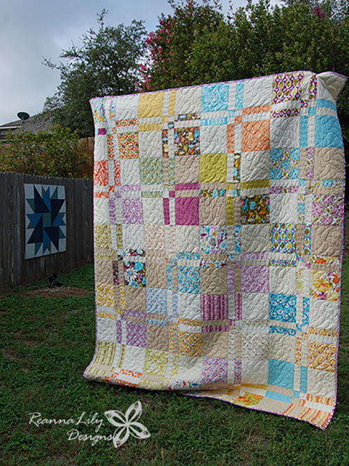 Disappearing 4-Patch Quilt with Layer Cakes