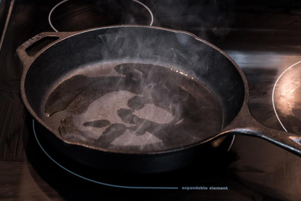 Prepare your pan by heating it over medium-high heat and coating with oil.