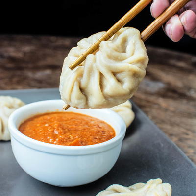 Steamed Vegetable Momos With Spicy Chili Chutney