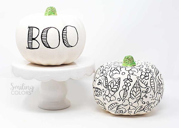 Lettering and doodling on a pumpkin