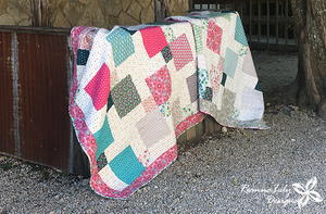 Disappearing 9-Patch Baby Quilt with Layer Cakes
