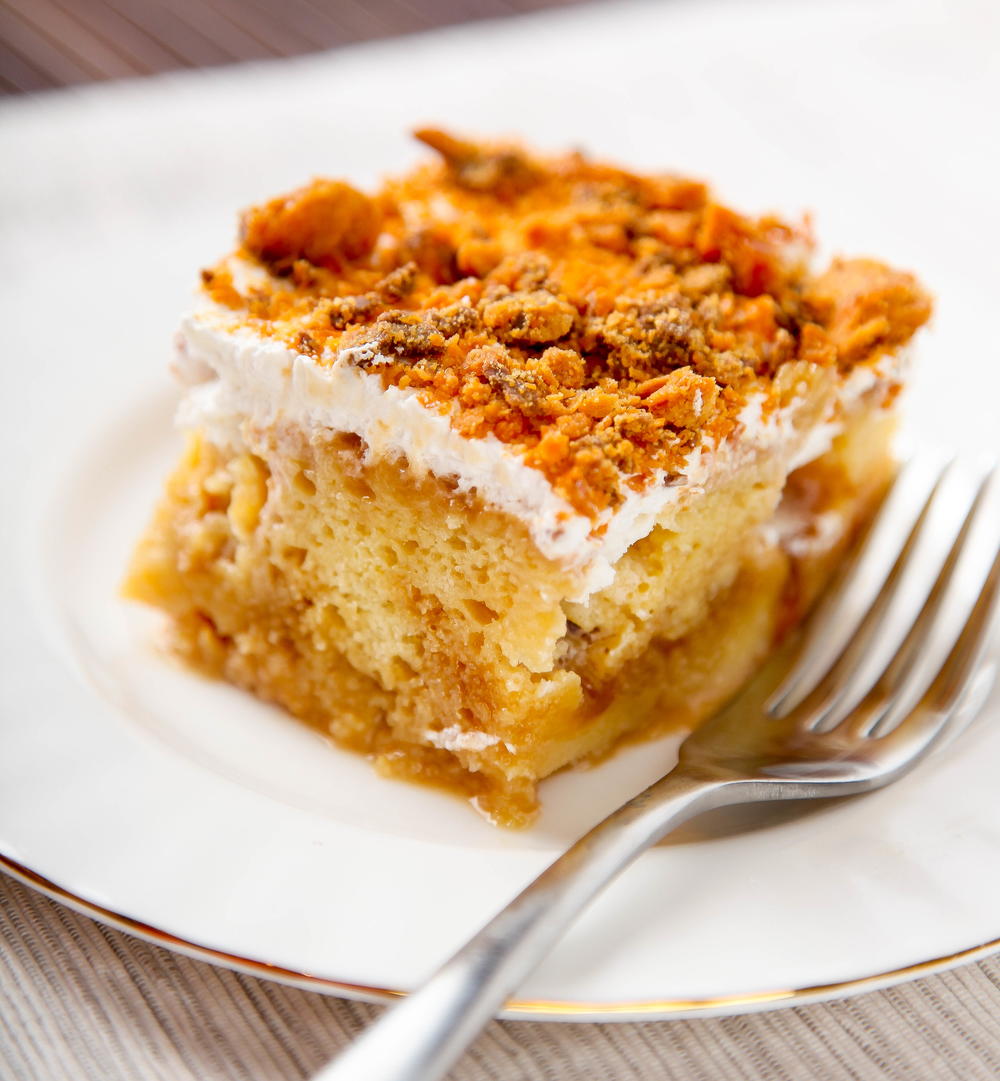 Butterfinger Poke Cake | FaveSouthernRecipes.com