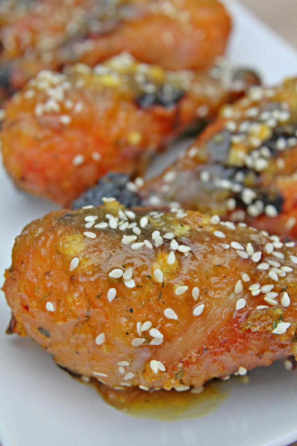 Sticky Orange Chicken Drumsticks | AllFreeCopycatRecipes.com