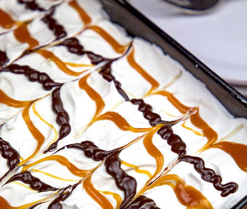 Decadent Caramel Eclair Cake | RecipeLion.com