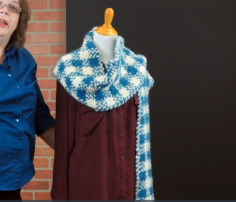 Image shows the Simple Wrap scarf tying example.