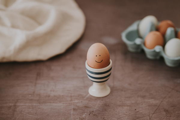 Egg with a smiley face drawn on it