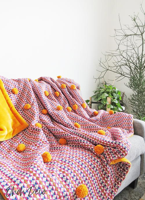 Pom poms blanket