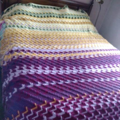 Image shows the Apache Tears Crochet Temperature Blanket.