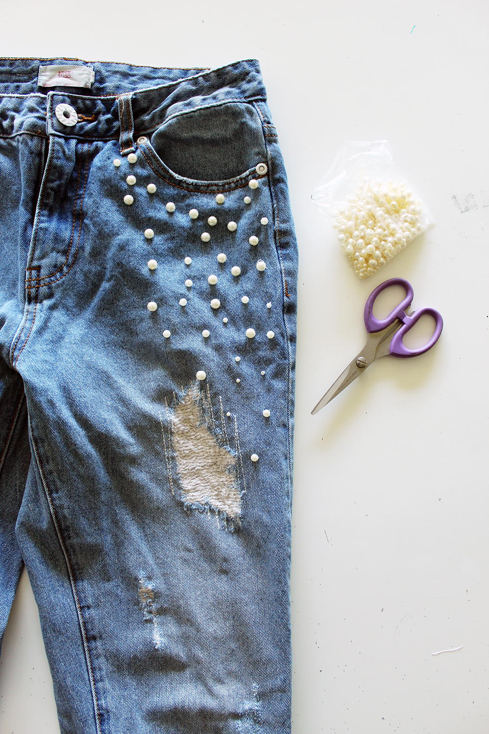 Make Your Own Pearl Accent Jeans | AllFreeSewing.com