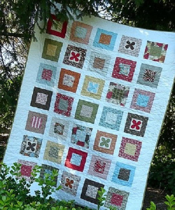 Blooms in Boxes Quilt | FaveQuilts.com