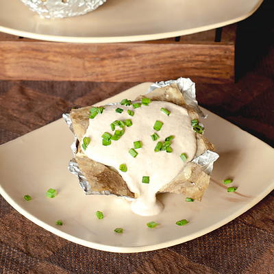 Oven Baked Potatoes in Foil with Sour Cream Garlic Sauce