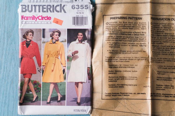 Image shows an example of a sewing pattern packet and pattern tissue.