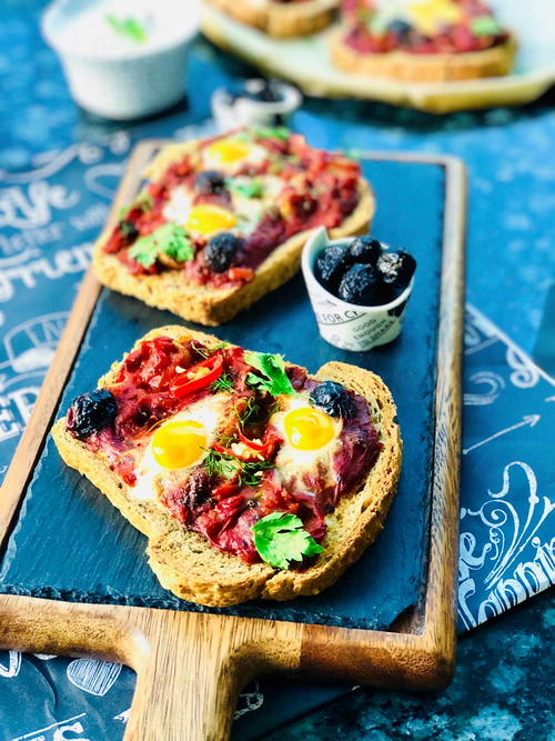 Quick Breakfast Pizza Slices with Quail Eggs and Tomato Sauce