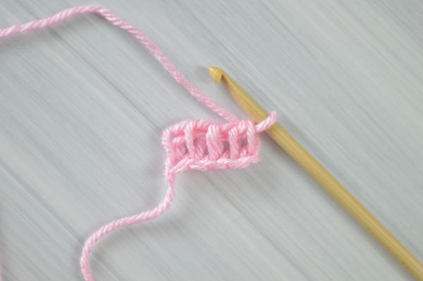 Images show step 9 for how to Tunisian crochet.