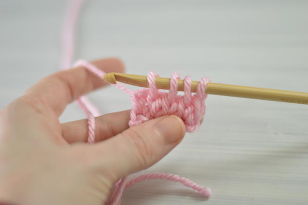 Images show step 10 for how to Tunisian crochet.