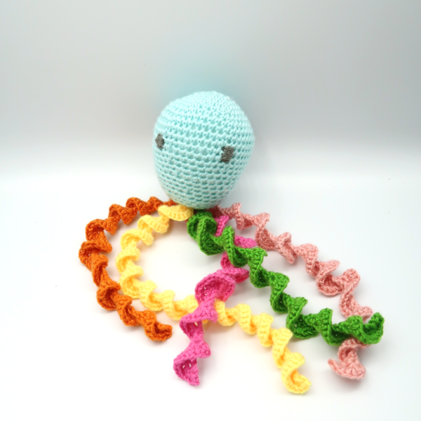 Images shows Emil, the Preemie Crochet Octopus.