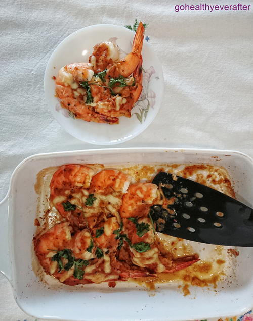 Baked tiger prawns with tomatoes