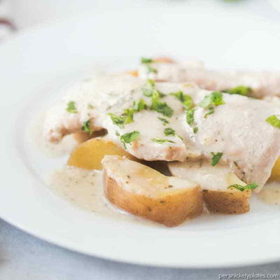 SLOW COOKER CREAMY RANCH PORK CHOPS AND POTATOES